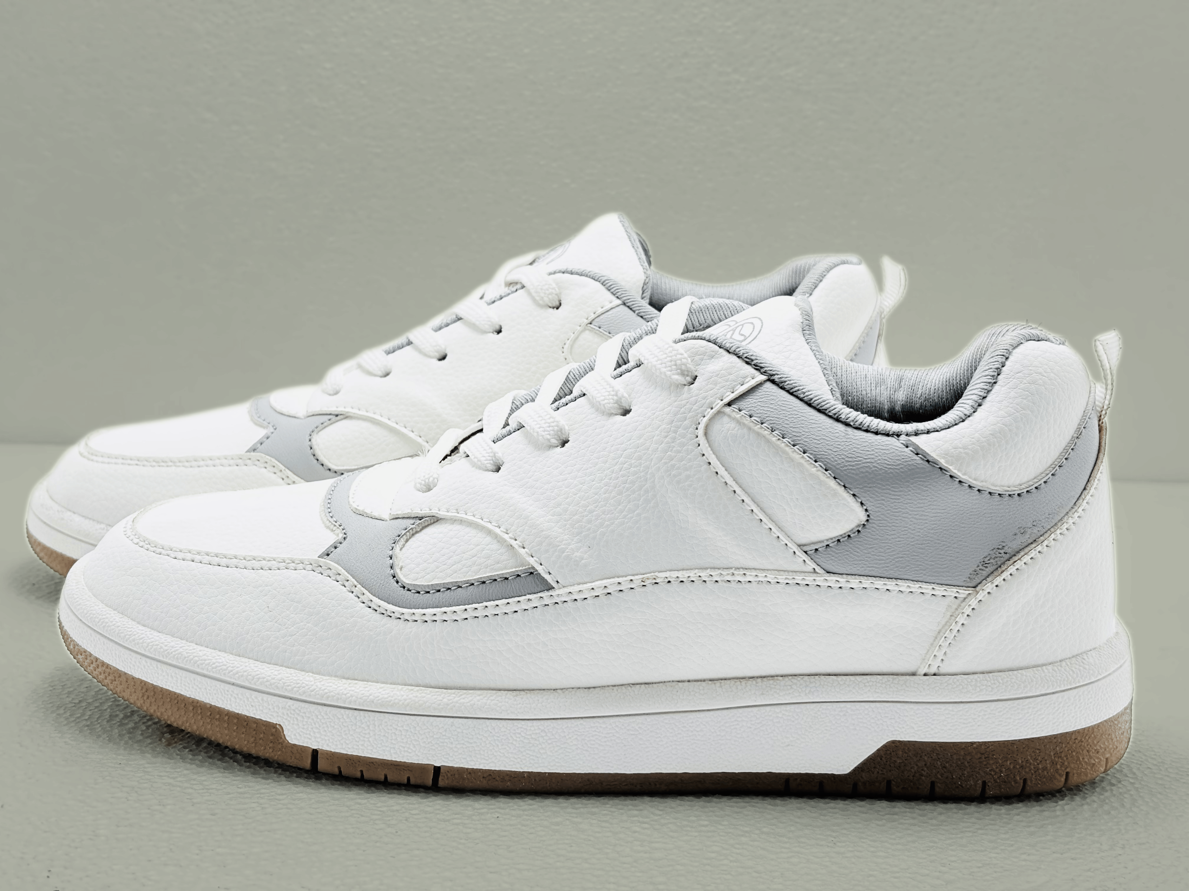 Mocha and white streetwear sneakers with premium comfort, everyday durability, and a bold statement look for men.